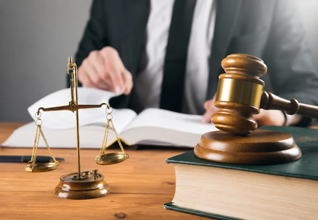 Law firm office featuring a judge’s gavel, legal scales, and law books, representing legal services and attorneys in Ohio.