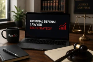 Criminal defense lawyer SEO strategy displayed on a laptop in a law office with a gavel, scales of justice, and legal books.