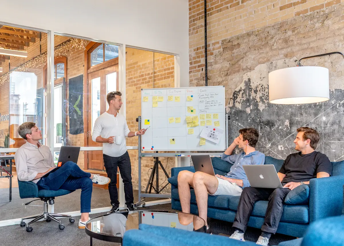 Team workshop planning AI automation on a whiteboard