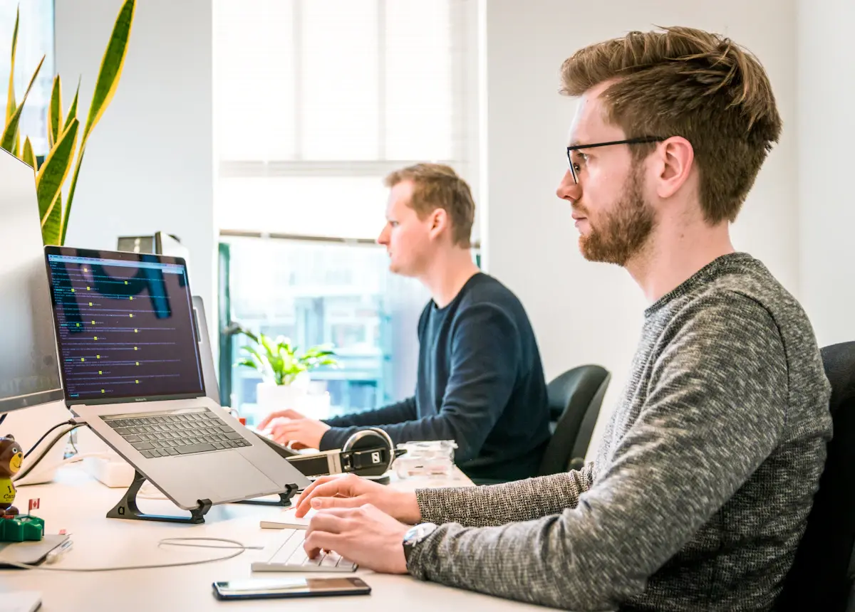 Team member using an internal AI assistant at his desk